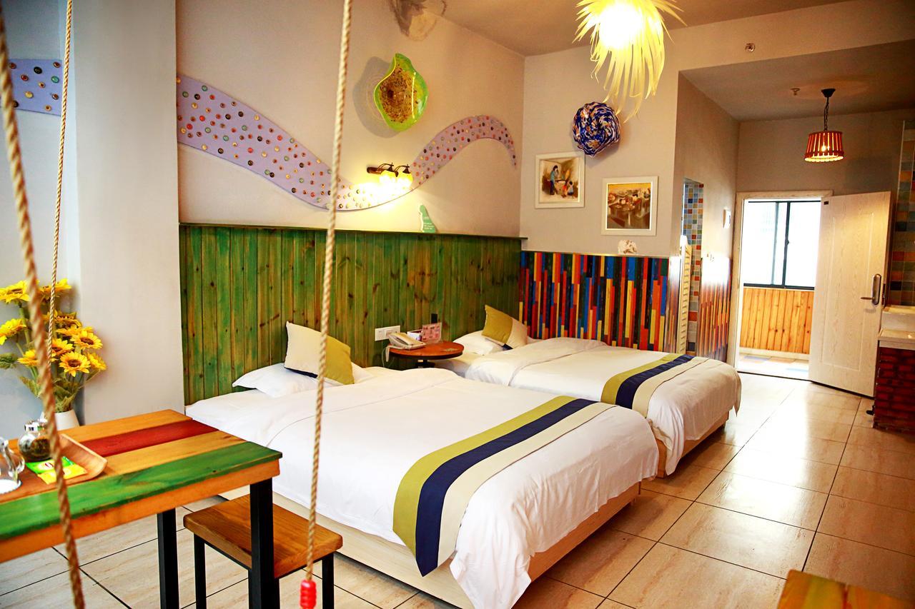 Haikou Time Inn Theme Hotel Exterior foto